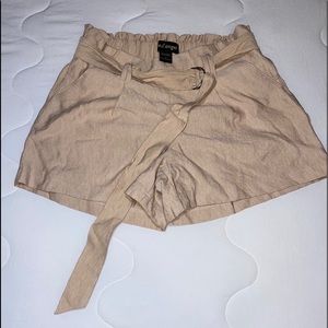 beige shorts